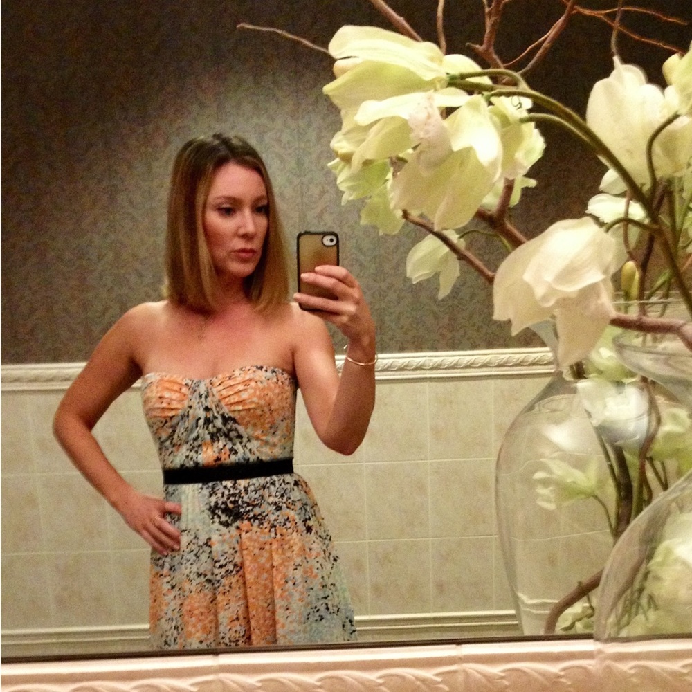 Excellent condition. Dress it Up or Down. Beautiful long sleeveless dress